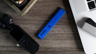 A blue vape pen placed on the table.