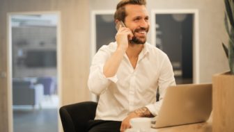 Man talking over phone.