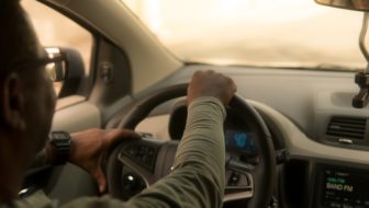 man driving taxi